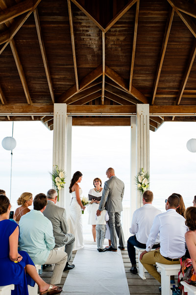Wedding ceremony on the dock. The Villas at Banyan Bay, Ambergris Caye, Belize. Belize Wedding Photography by Leonardo Melendez Photography.